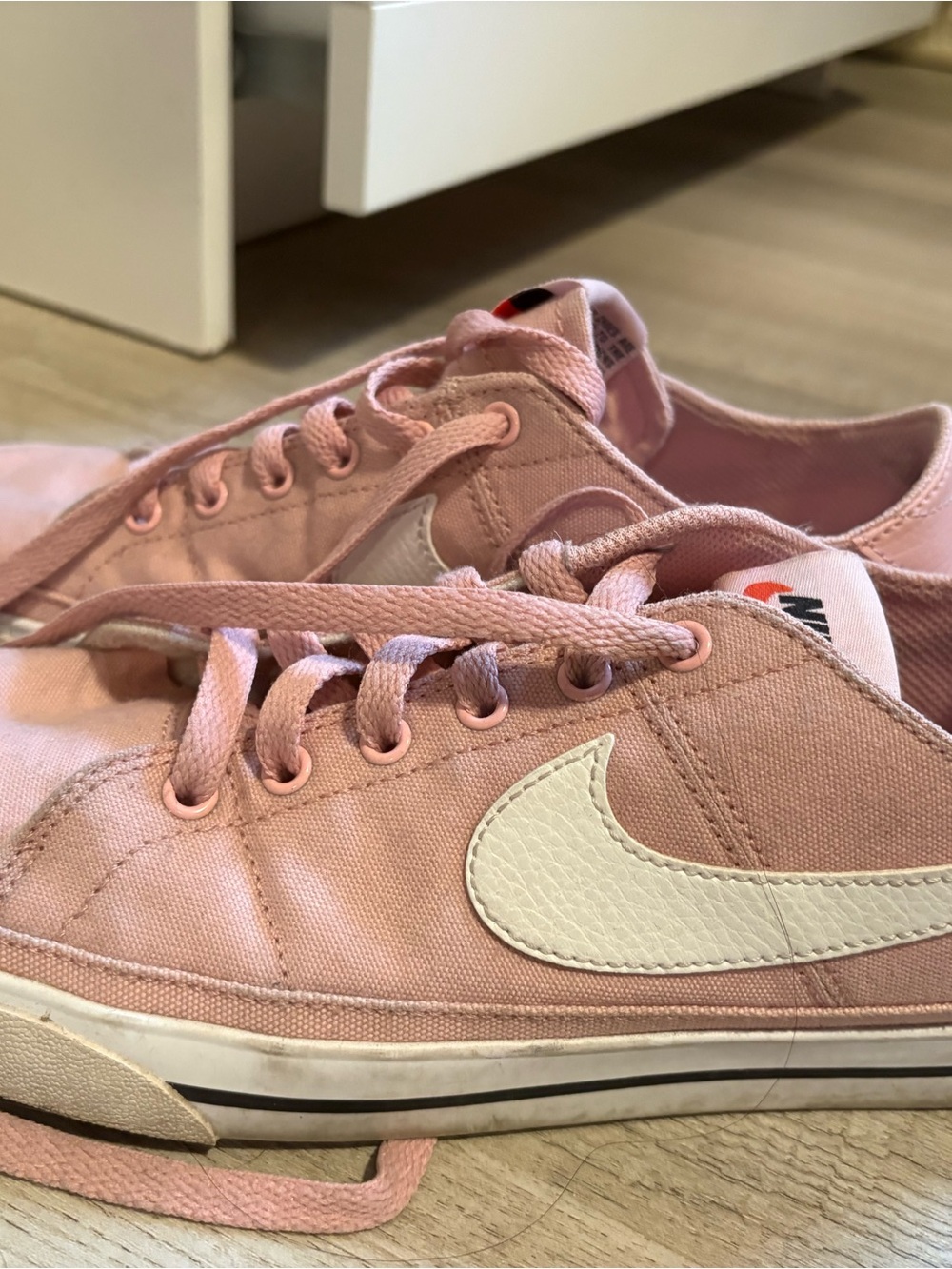 Nike Women’s Pink Low-Top Canvas Sneakers with White Swoosh